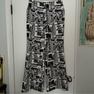Urban Outfitters UO Dalila Flare Pants Womens S Low Rise Y2K newspaper Print